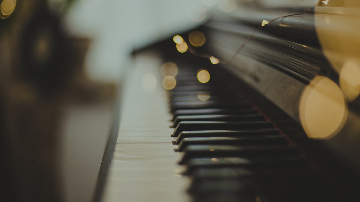 Piano keyboard in warm studio light